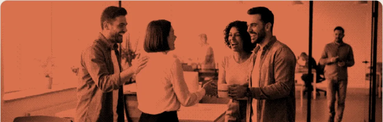 Colleagues welcoming a new starter in an office